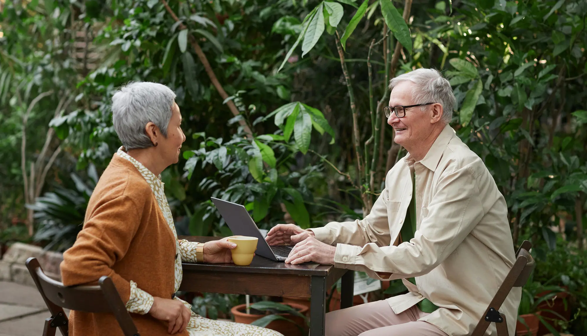 A retired couple reviewing dental plan options together
